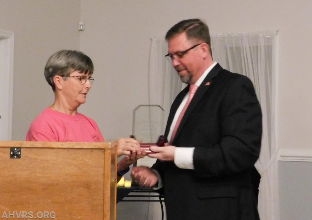 Rescue Chief Jayne Toellner presents Jeff Walker with Squad Person of the Year Award